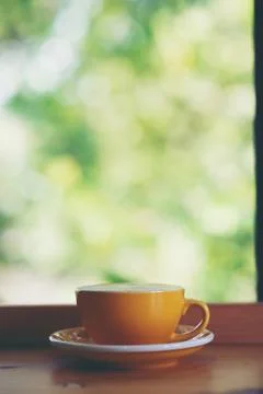 Hot coffee is placed in the same table in the morning of every day. Coffee at Foto stock