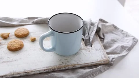 Hot coffee pouring into cup Stock Footage 136067350