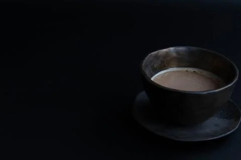 Hot Coffee in a rustic ceramic cup Stock Photos