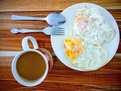Hot coffee, scrambled eggs. Foto stock