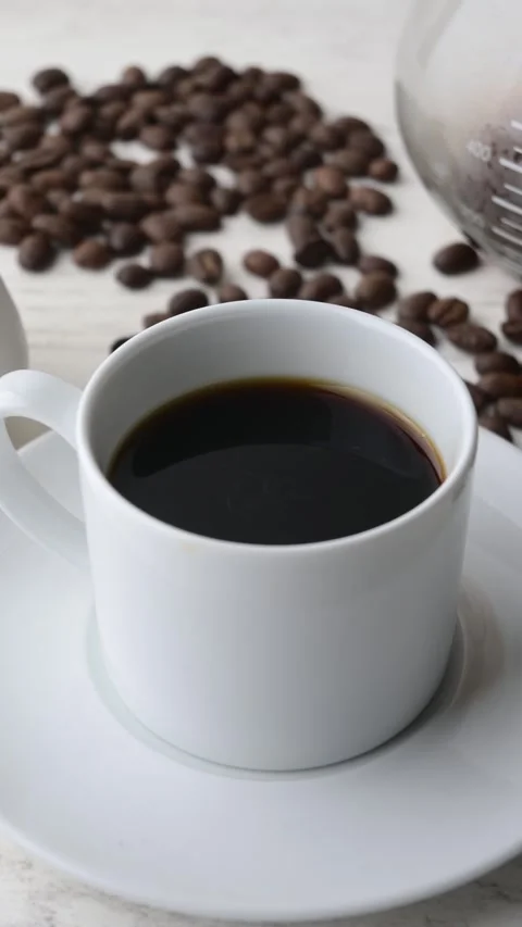 Hot coffee in a white cup Stock Footage 273636850