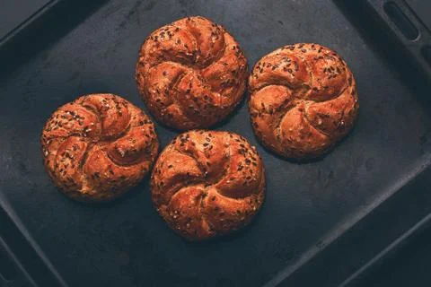 Hot cooked buns in the pan Stock Photos
