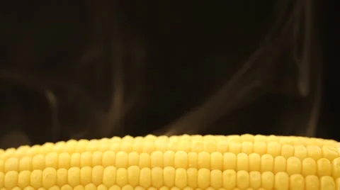 Hot corn and steam emanating from it Video stock 43851058