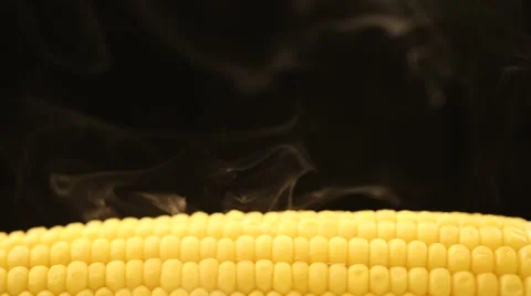 Hot corn and steam emanating from it Stock Footage 43851172