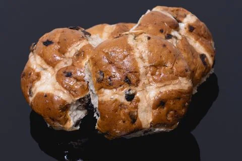 Hot Cross Buns on black background Stock Photos