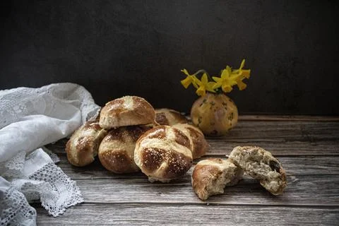 Hot  cross buns  in a  rustic  setting Stock Photos