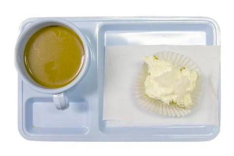Hot cup of coffee with cake on isolate white background. Stock Photos
