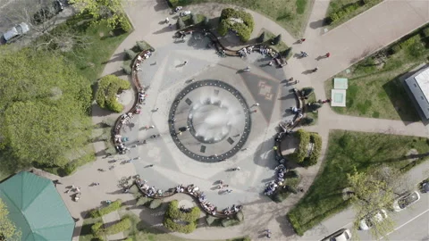 On a hot day people refresh themselves with cold water from the fountain Stock Footage 115181665