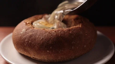 Hot dish soup in a bread plate Stock Footage 123135141