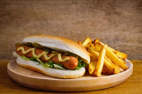 Hot dog and french fries Stock Photos