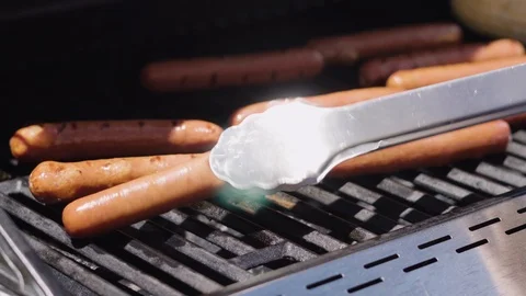 Hot dog bar with corn on the cob for July 4th celebration on the back patio. Stock Footage 117218333