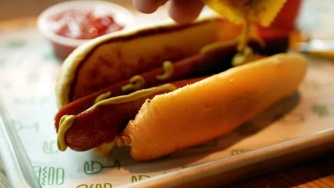 Hot dog with drink on table Stock Footage 202835159