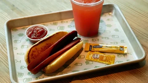 Hot dog  With drink on table 스톡 동영상 202835163