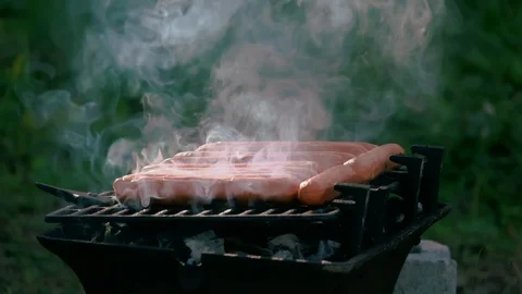 Hot dogs on the grill Stock Footage 128550136