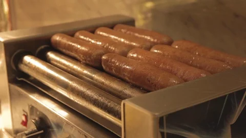 Hot Dogs rotating on a Warming Rack Stock Footage 114019158
