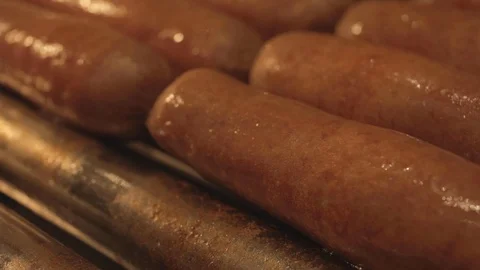 Hot Dogs rotating on a Warming Rack Stock Footage 114019248