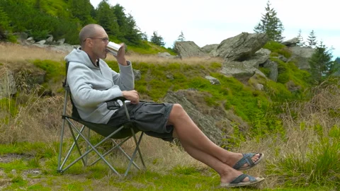 Hot drink in the mountains. Stock Footage 312462456
