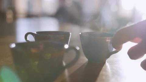 Hot Drink Slow Motion Hand Grabbing Steaming Cup Handheld Closeup B-roll 102848825
