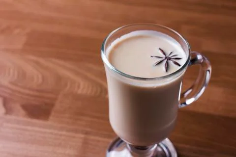 Hot eggnog on the wooden background Stock Photos