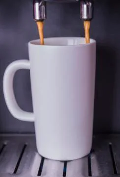 Hot espresso from coffee machine Foto stock