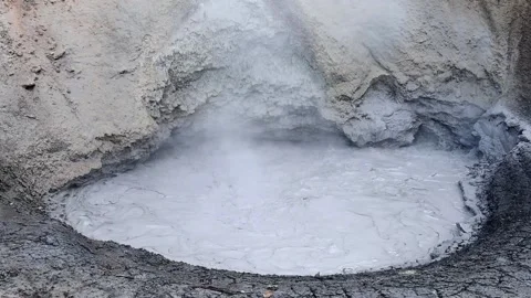 Hot exploding mud of Mud Volcano in Yellowstone National Park Stock Footage 140531143