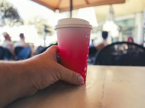 Hot filter coffee served in a paper cup at a cafe Foto stock
