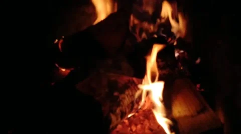 Hot fire in the fireplace during the day Stock Footage 220556750