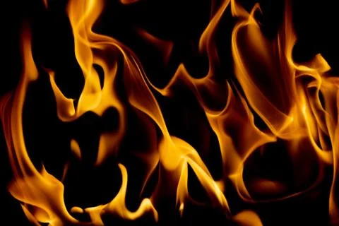 Hot fire flames - abstract background and texture concept Stock Photos