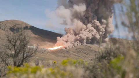 Hot fire test of a SLS solid rocket booster at Northrop Grumman Test Facility Stock Footage 281724159