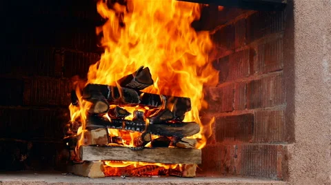 Hot Fireplace Full of Wood and Fire Stock Footage 59656041