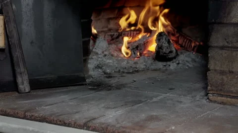 Hot flame of fire in a stone oven. Stock Footage 159428236