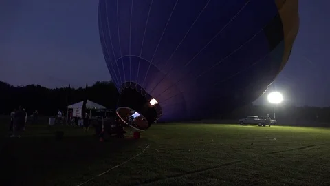 Hot flames being fired into hot air Balloon at dawn Stock Footage 77735066