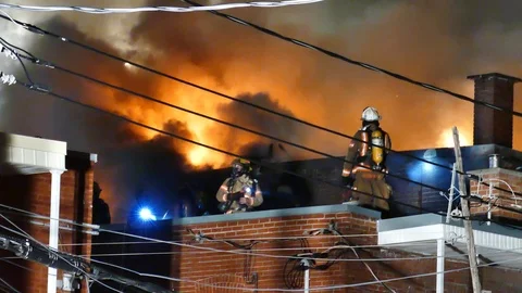 Hot flames burning buildiing Stock Footage 115933962