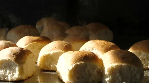 Hot fresh bread, steam, smoke Stock Footage 103285333