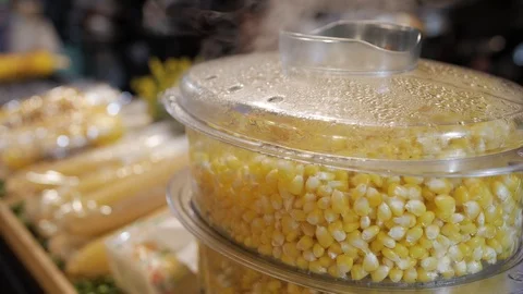 Hot fresh steamed sweet corn Stock Footage 126540596