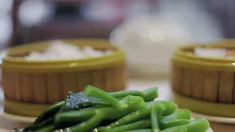 Hot fresh steaming dim sum, Chinese restaurant, eating delicious food, dumplings Stock Footage 204101812