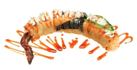 Hot fried sushi rolls in the shape of a dragon. Isolated on white background. Stock Photos
