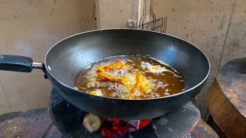 Hot frying pan on fire Stock Footage 252336473
