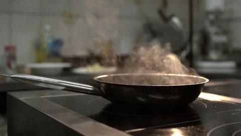 Hot frying pan on the oven. Presentation of the dish in the restaurant. Stock Footage 84037067