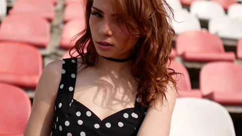 Hot girl in a dress. A woman is seductively behaving. Stock Footage