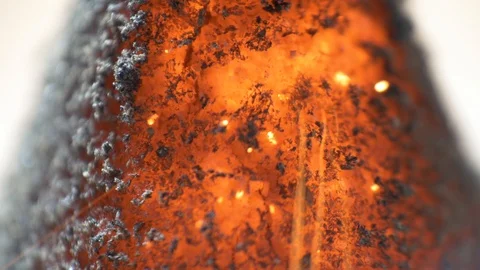 Hot glowing ash, incense burning macro, ash coal texture detail Video stock 127442289