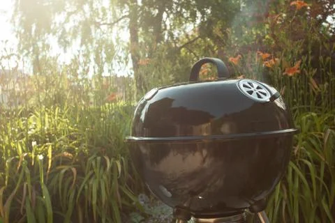 Hot grill on a backyard Stock Photos