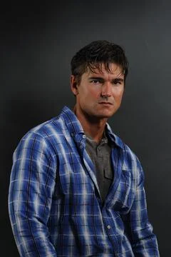 The hot guy poses for the photo Stock Photos