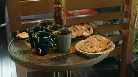 Hot herbal mint tea drink in mugs over wooden tray with fresh garden mint l.. Stock Footage 341227889