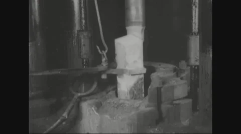 Hot iron being hollowed Stock Footage 43312073