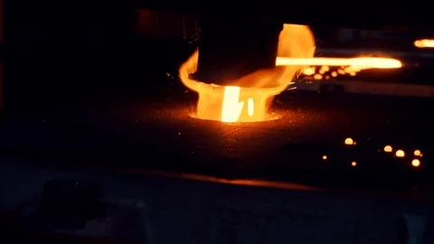Hot iron is processed in the foundry. pouring hot lava in foundry. foundry Stock Footage 112777386
