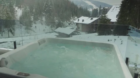 Hot jacuzzi with mountain views Stock Footage 295997145