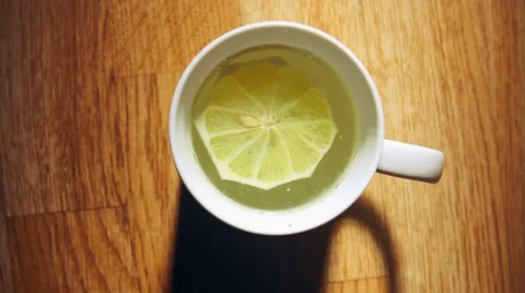 Hot lemon tea, good source of vitamin C Stock Footage 61209359