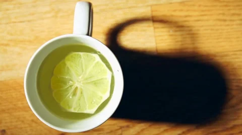 Hot lemon tea, good source of vitamin C Stock Footage 61209434