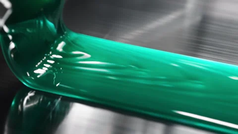 Hot liquid caramel on a conveyor. Stock Footage 277010597